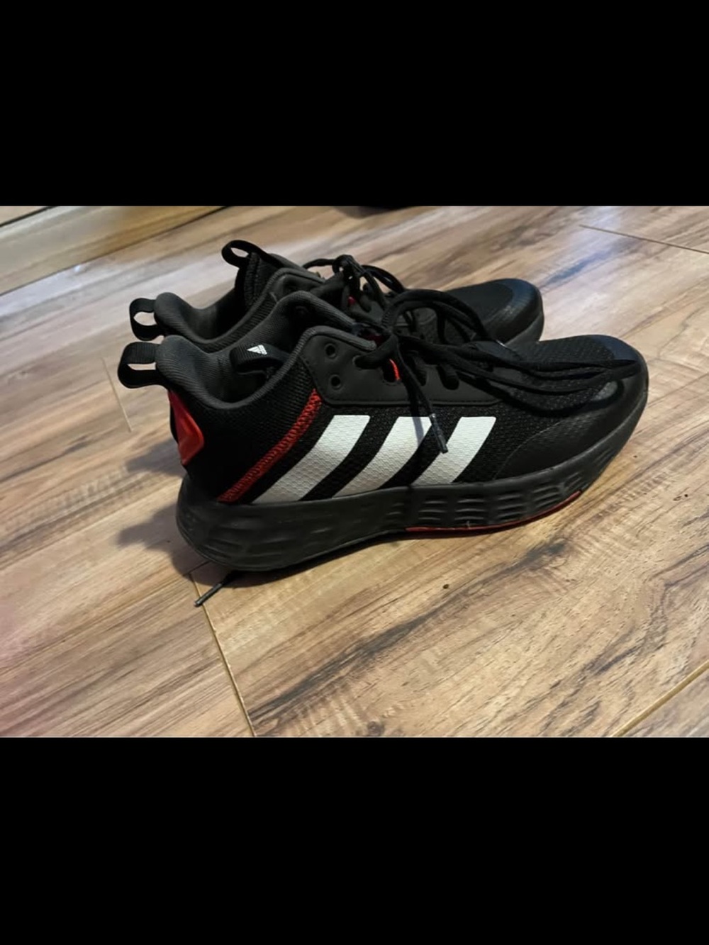 adidas Black Sneakers with White Stripes and Red Accents